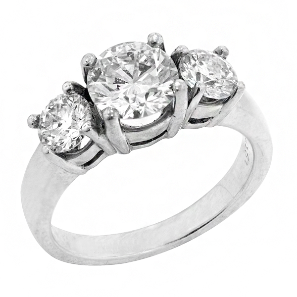 View Round Three Stone Diamond Engagement Ring in Platinum