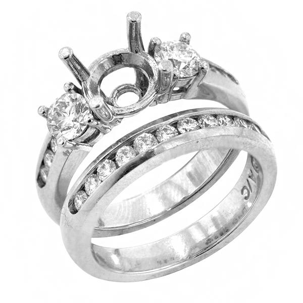 View Round Three Stone Diamond Bridal Set in Platinum