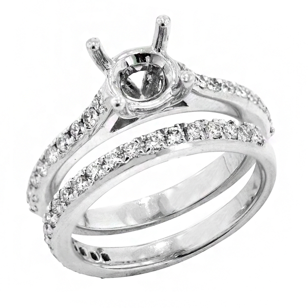 View Traditional Four Prong Diamond Bridal Set Engagement Ring in Platinum