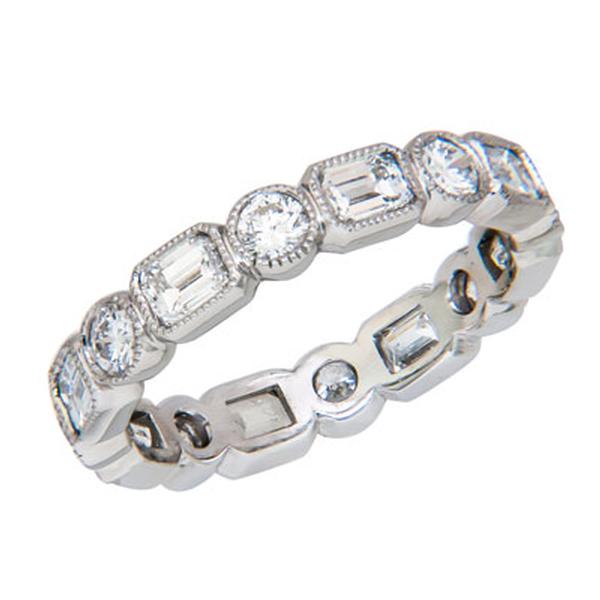 View Custom Made Diamond Eternity Band With Emerald Cut and Round Diamonds Set in Platinum
