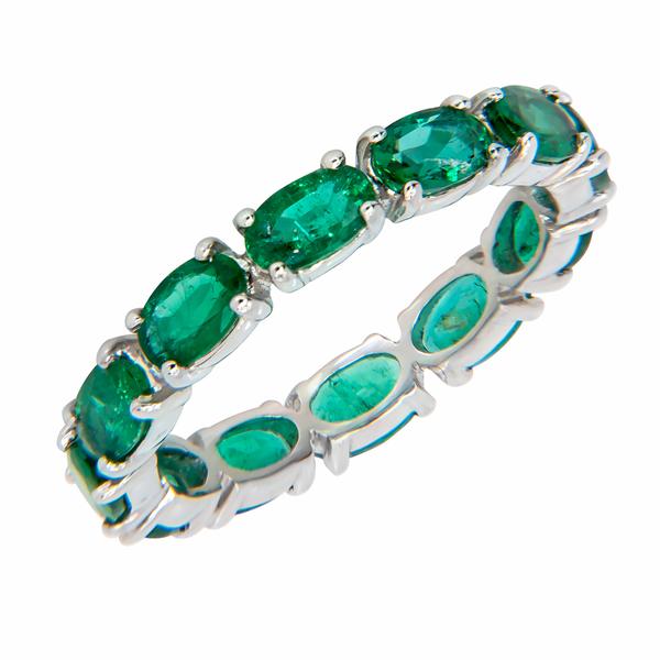 View Custom Made Oval Shape Emerald Eternity Band set in Platinum
