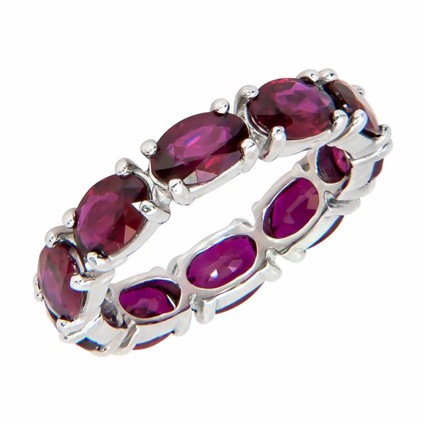 View Custom Made Oval Shape Ruby Eternity Band set in Platinum